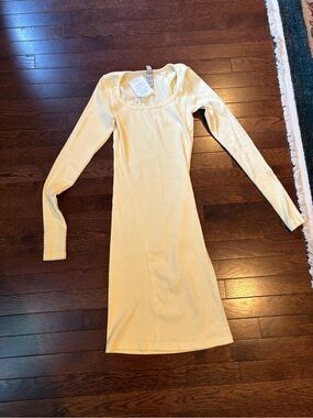 Kasics Long Sleeve Scoop Neck Mini Dress in Lemon Yellow